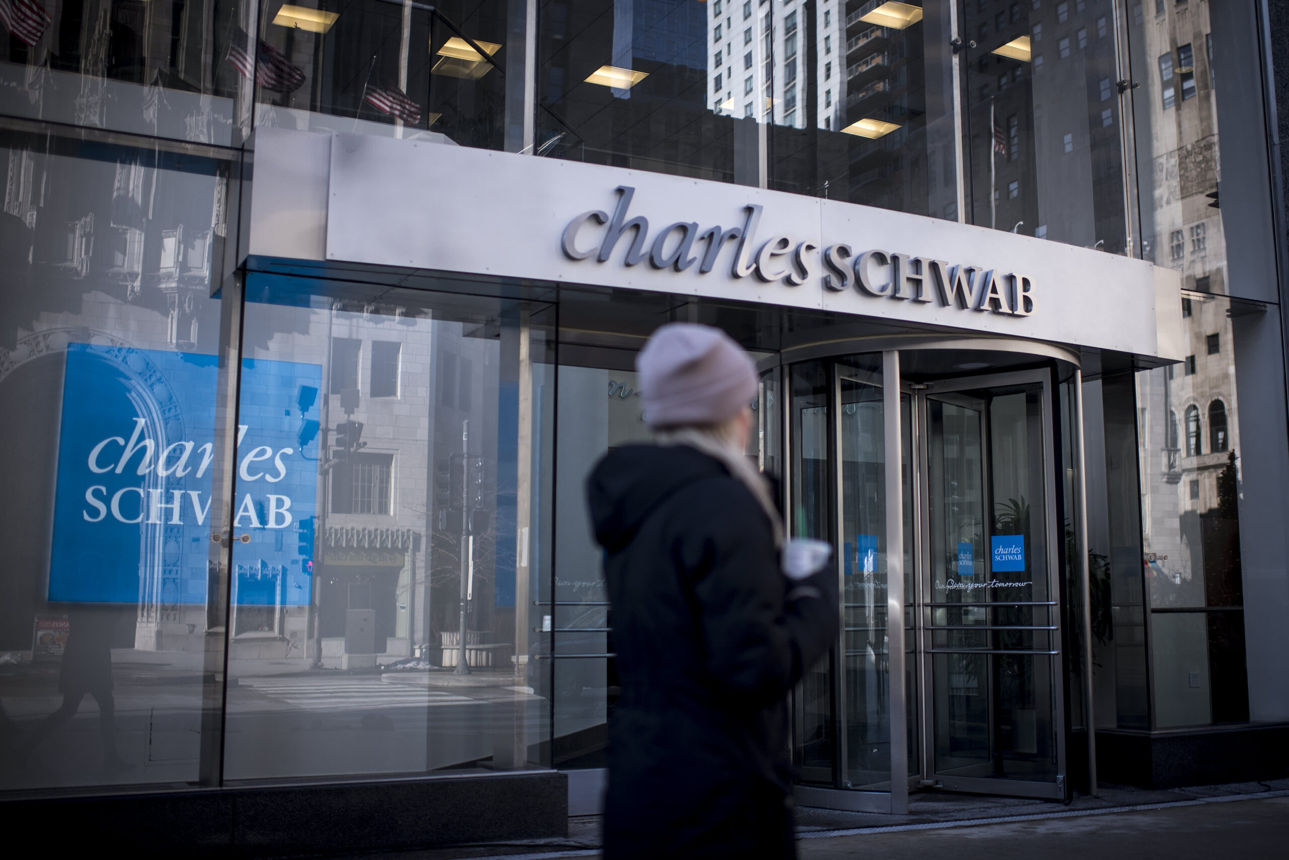 Charles Schwab to give most employees 5% raise, pushes back return to office