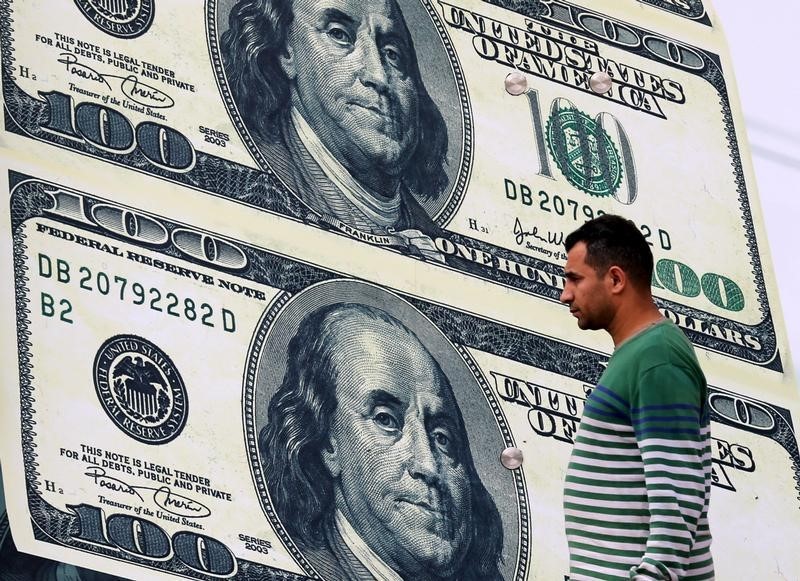 Rouble skids to all-time low, dollar surges as West bolsters Russia sanctions By Reuters